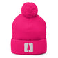 Pom pom beanie with the Round Pond Getaway logo embroidered in white. neon pink.