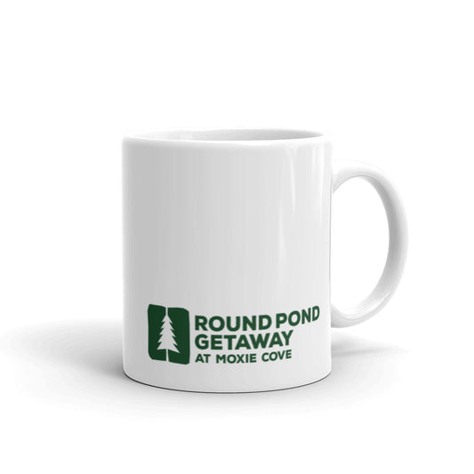 white coffee mug with the round pond getaway logo in green